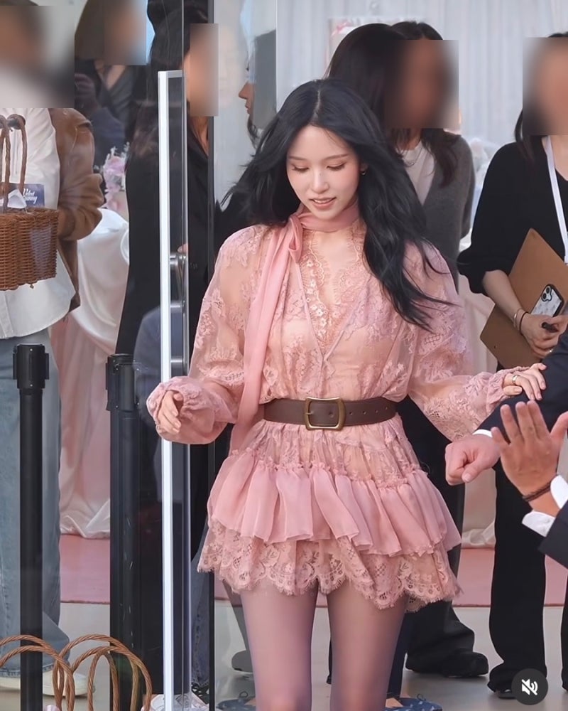 Celebrity wearing a see-through pink princess dress