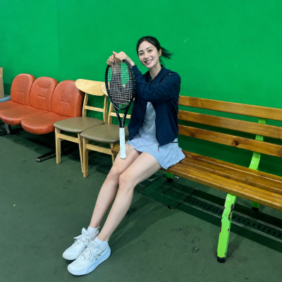 "They say she's on the Karina level of the baseball and tennis world..." The casual look of an innocent beauty former tennis player