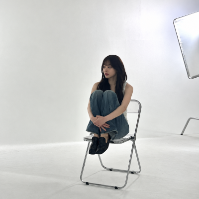 "She missed out on the I.O.I 10th-anniversary reunion..." but in the drama, she returns as a company employee in her fifth year.